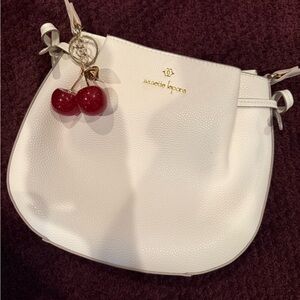 Nanette Lepore White Crossbody Bag with Cherry Charm